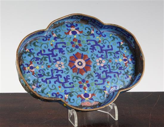 An unusual Chinese enamel on copper quatrefoil-shaped tray, Qianlong four character mark and of the period (1736-95), 18cm, damage and